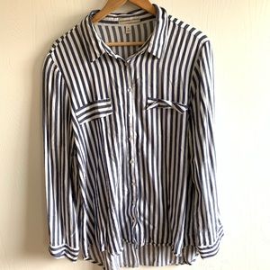Navy blue and white stripped button down shirt with faux shell buttons.